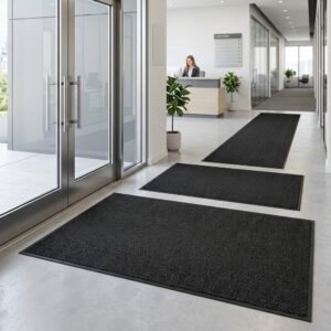 Professional floor mat at a facility entrance designed to trap dirt, dust, and moisture to improve indoor hygiene standards.